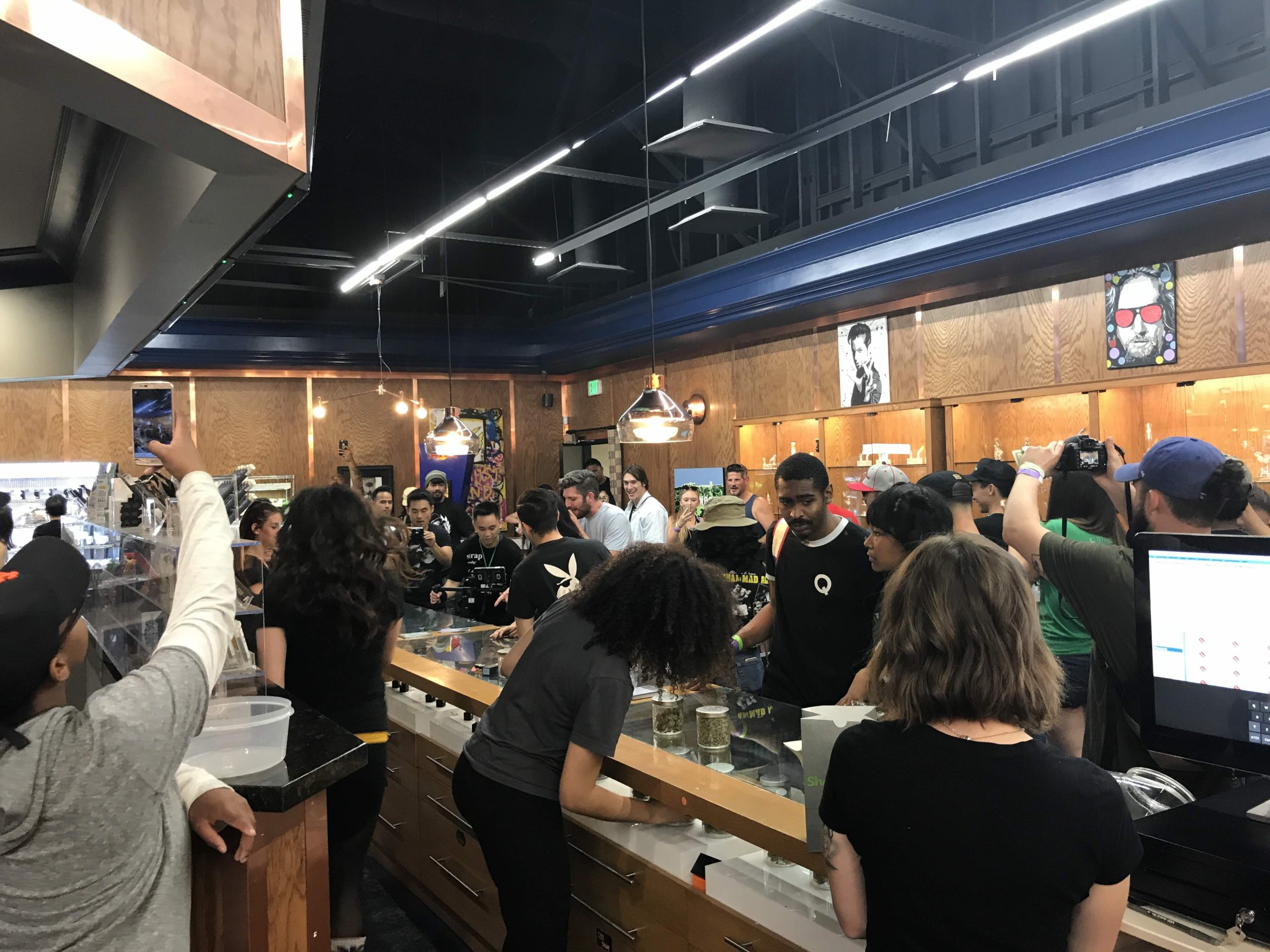 Dispensary staff using digital systems to support customer service